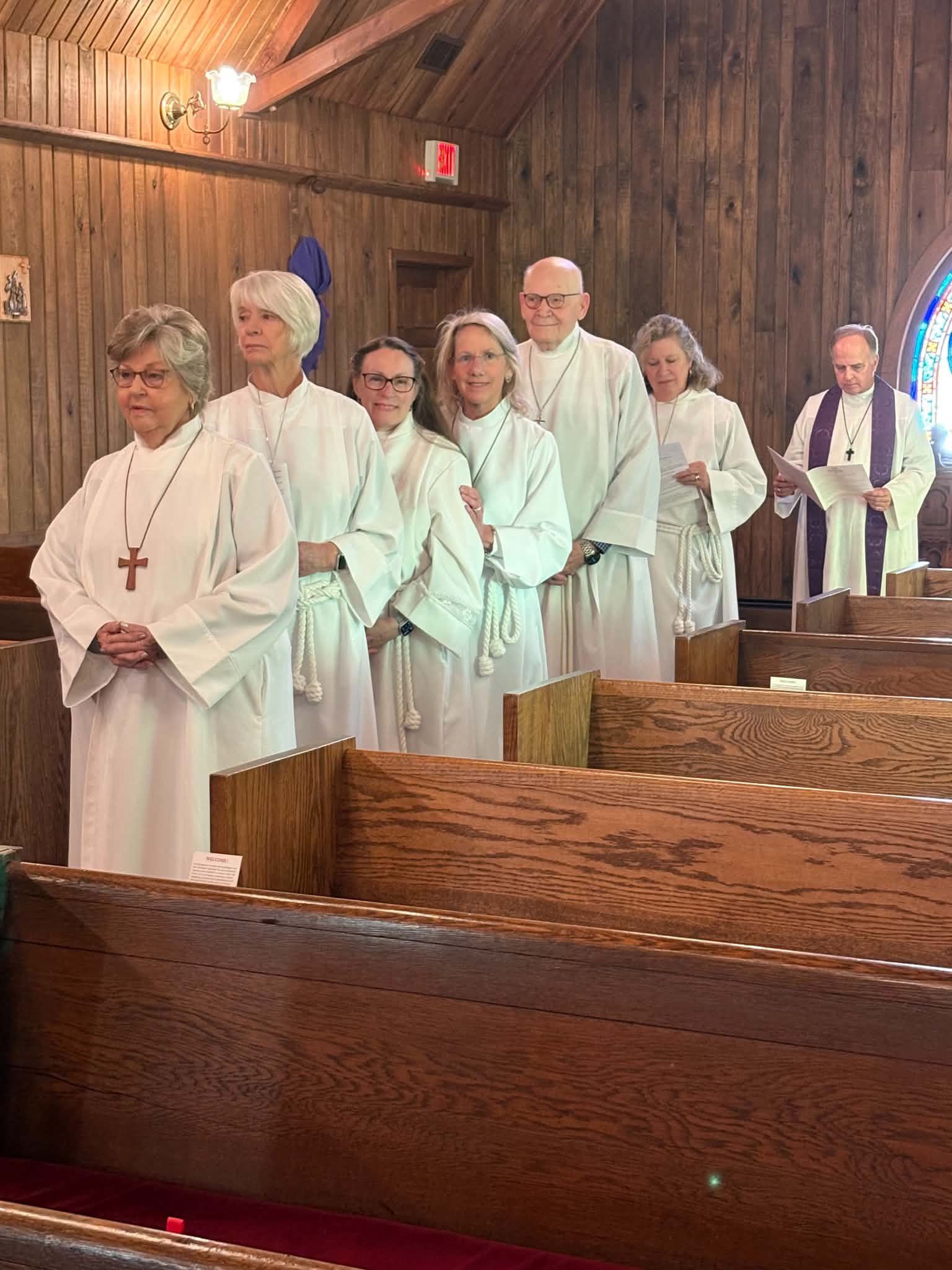 Lay ministers and clergy of All Saints Episcopal Church gathered for Holy Eucharist, Rite II